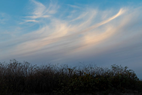 Beautiful cloud over a berm in Galveston, TX